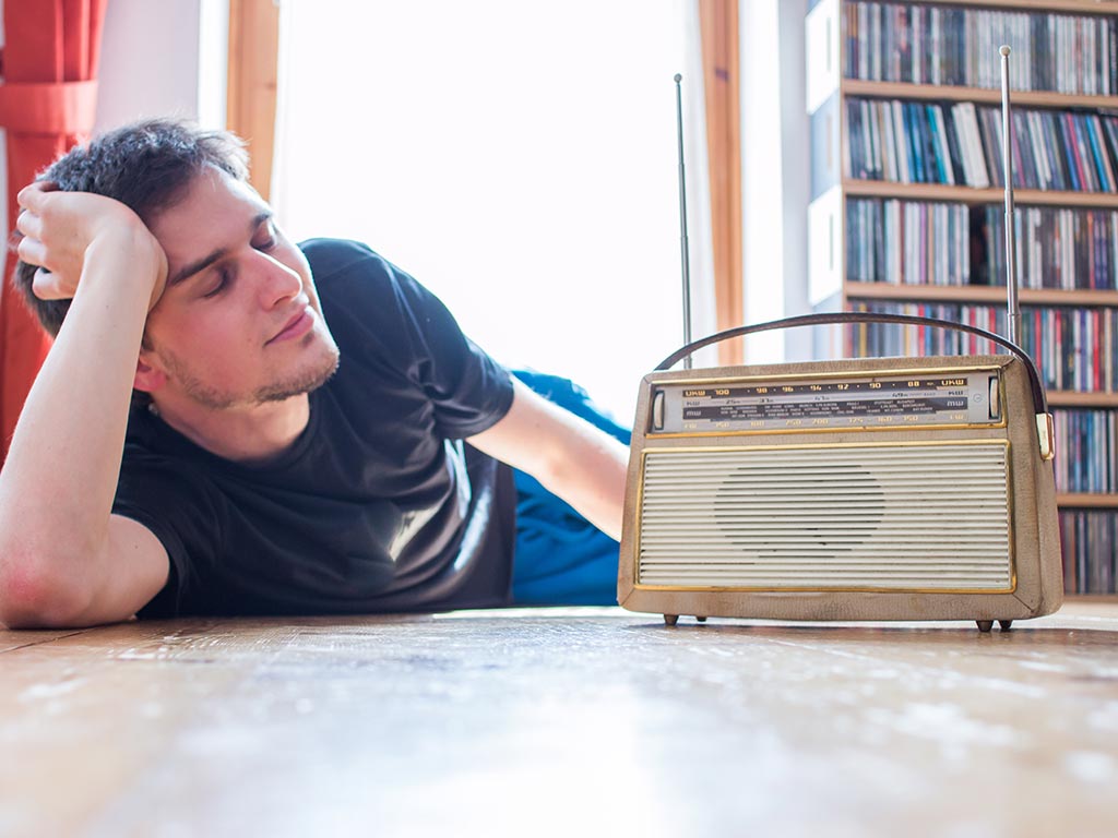 Young Man Listing To Music Calmly